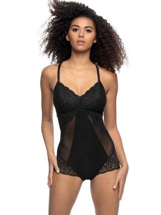 Birta - Woman wearing a black lace bodysuit on a white background