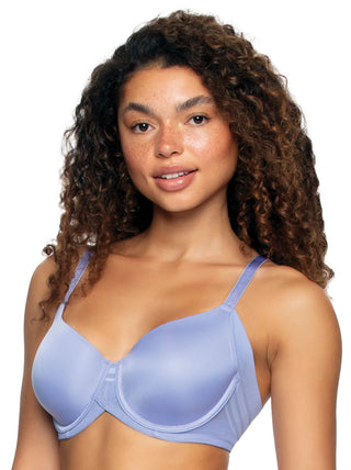 Quinn - A woman wearing a periwinkle colored, seamless, side-smoothing t-shirt bra.
