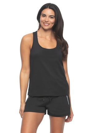 Kyra A woman wearing a black racer back tank top and matching shorts with reflective stripes along the back of the tank and sides of shorts