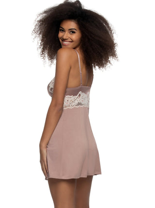 Woman wearing a pink lace-trimmed camisole nightgown on a white background back view