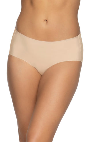 A person wearing a tan No Show Elastic Free Brief.