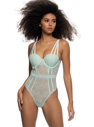 Birta Woman wearing a light blue lace bodysuit on a white background