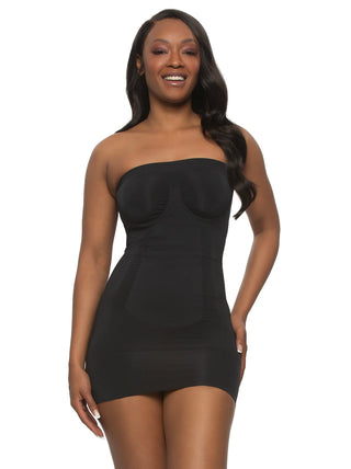 Anala - A woman wearing a black strapless full slip with fused compression panels.