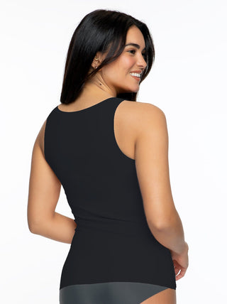 Kyra Woman wearing a black tank top on a white background back view