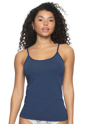 Quinn A woman wearing a navy blue cotton modal stretch camisole with spaghetti straps.