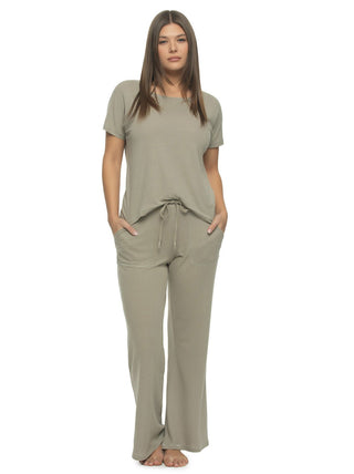 Victoria A woman wearing a blue short-sleeved crew neck tee and matching wide-leg pants with a drawstring waistband and cargo pockets.