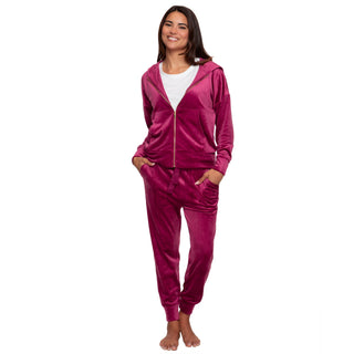 Kyra Woman wearing a burgundy velvet zip-up hoodie partially zipped with white crew new tshirt underneath and matching pants on a white background