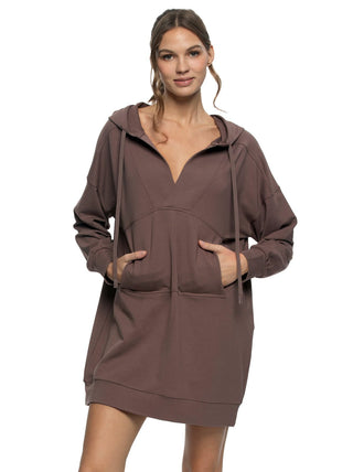 Daria Woman wearing a brown hooded dress on a white background